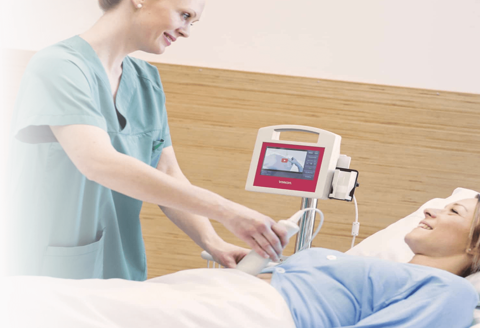 Healthcare professional using Vitascan bladder scanner
